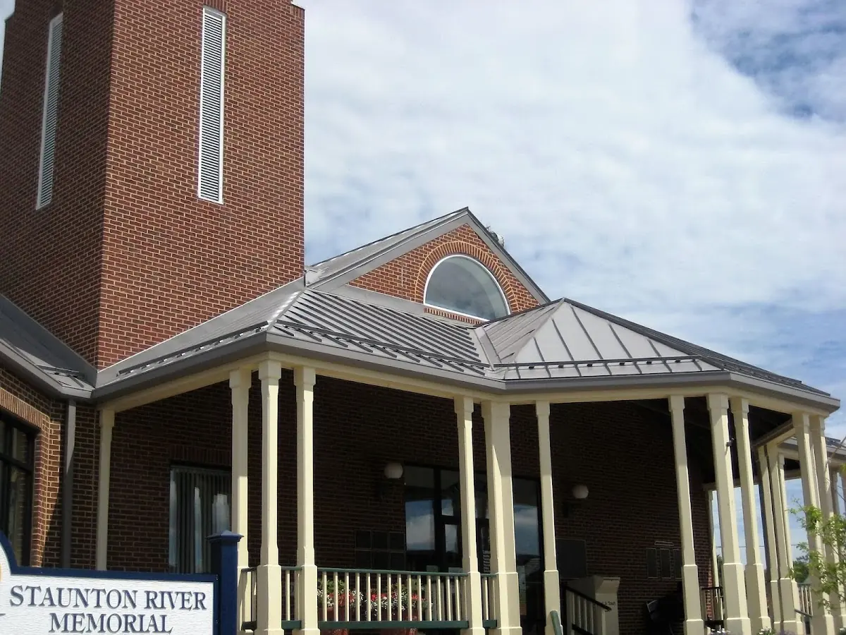 Skilled roofing craftsmen working on a residential roof in Culpeper